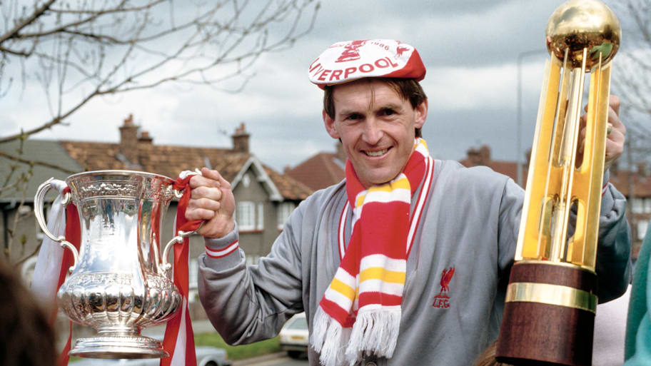 Kenny Dalglish posing with his trophies.