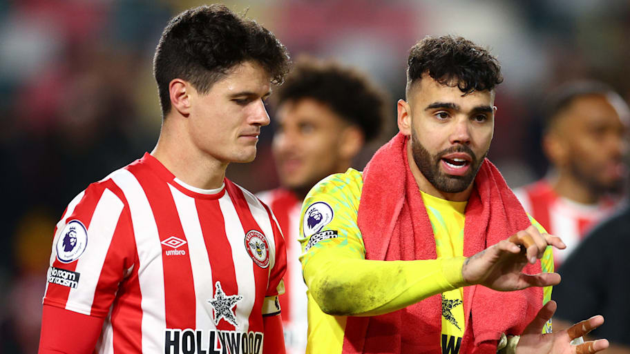 Christian Nørgaard (left) and David Raya for Brentford.