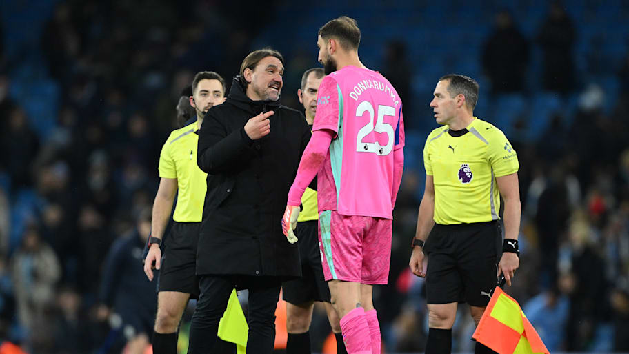 Daniel Farke (left) having words with Gianluigi Donnarumma.