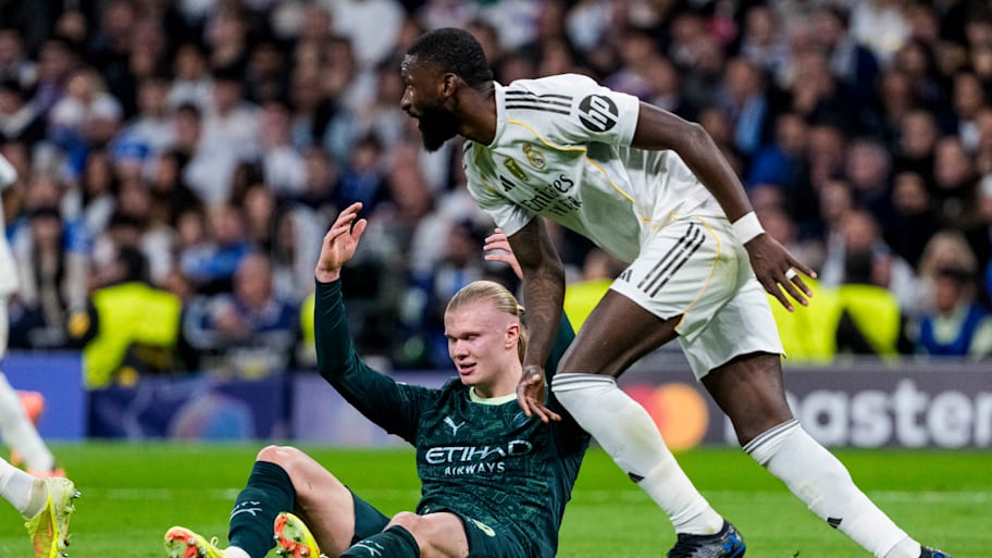 Erling Haaland (left) and Antonio Rüdiger.