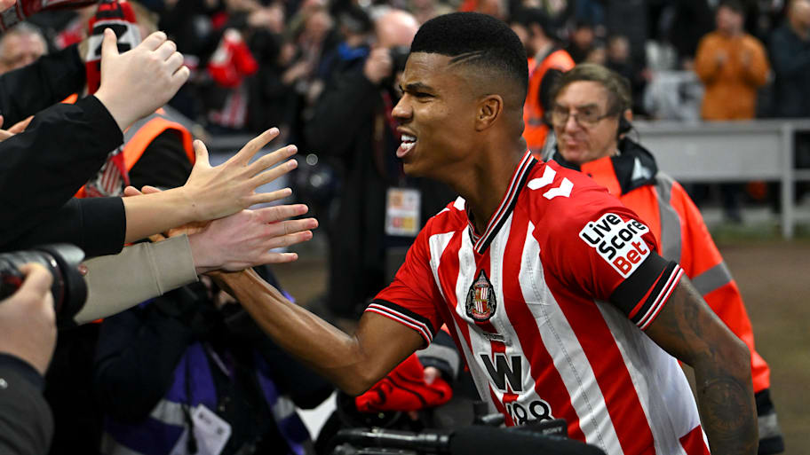 Reinildo celebrating.