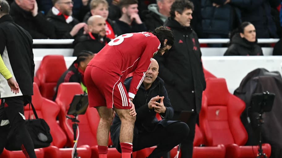 Dominik Szoboszlai hunched over.