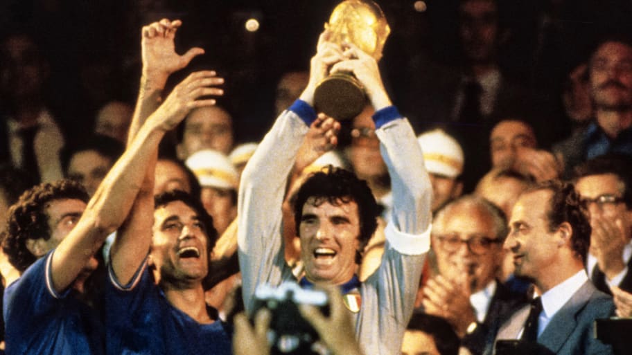 Dino Zoff hoisting aloft the World Cup.