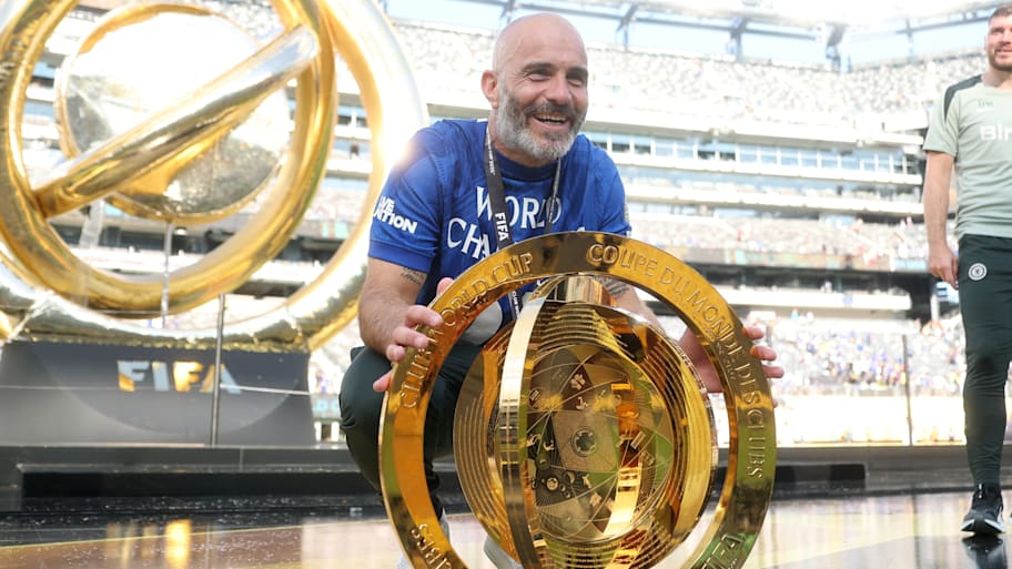 Enzo Maresca posing with the Club World Cup trophy.