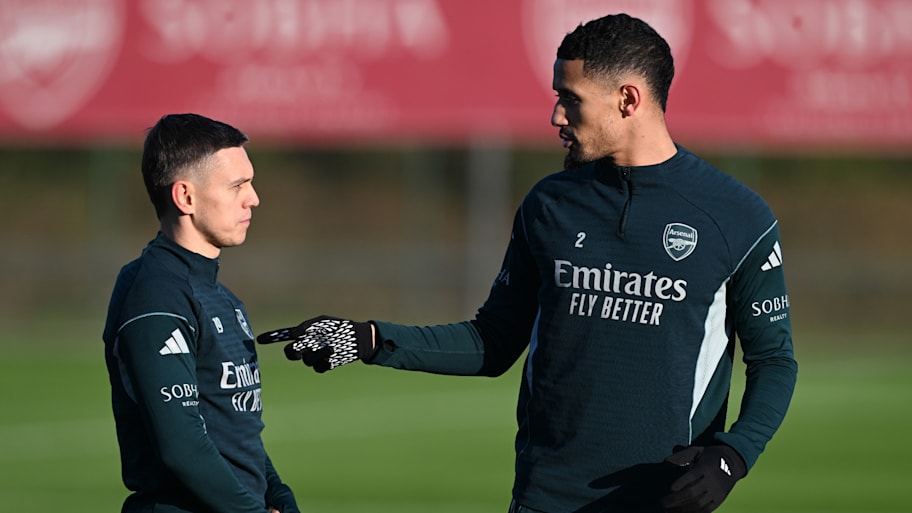 Leandro Trossard (left) and William Saliba.