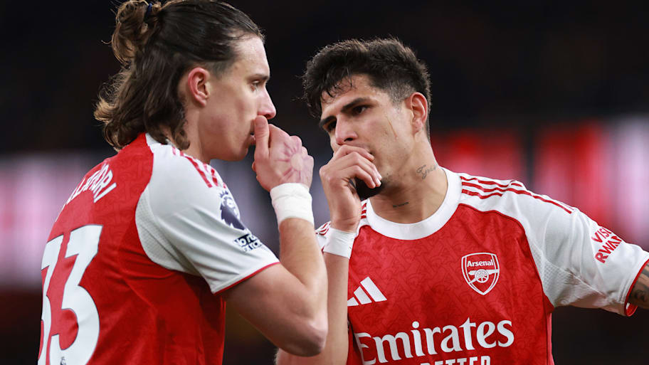 Riccardo Calafiori (left) and Piero Hincapié whispering.