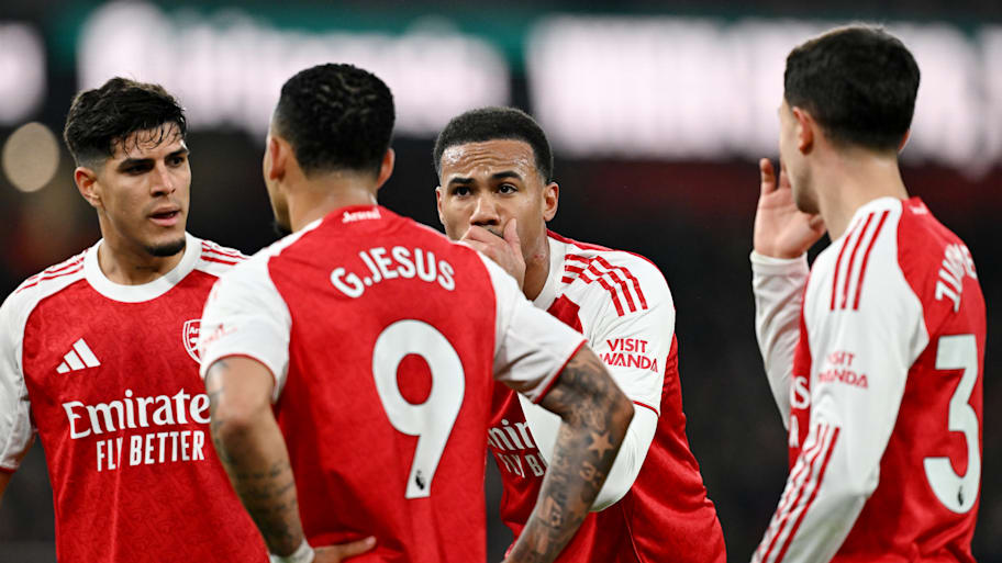 Four Arsenal players in conversation.