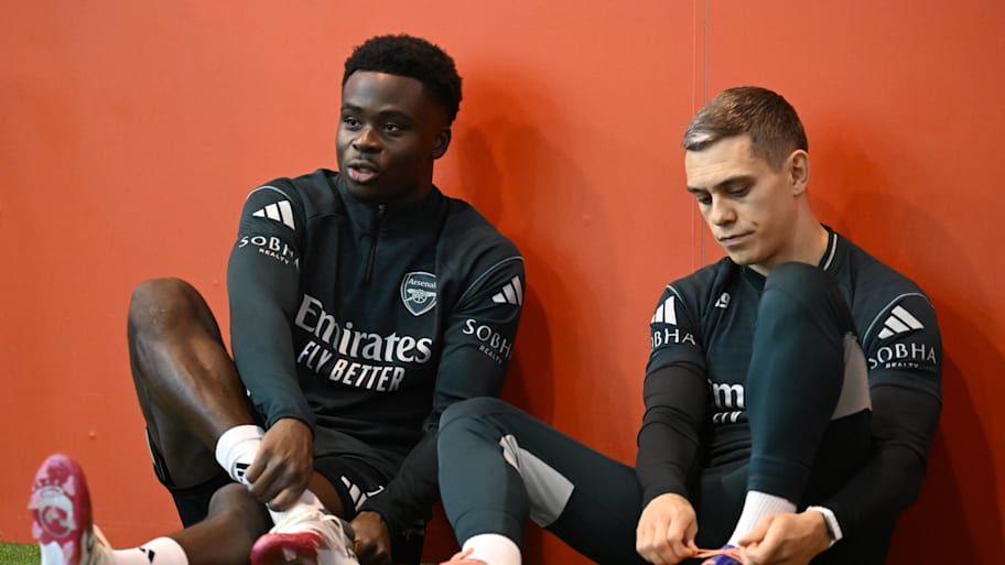 Bukayo Saka (left) and Leandro Trossard.