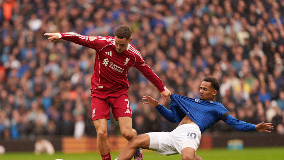 Florian Wirtz challenging for the ball.