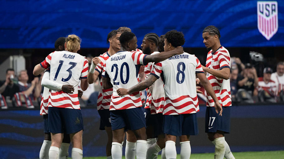 USMNT celebrating.