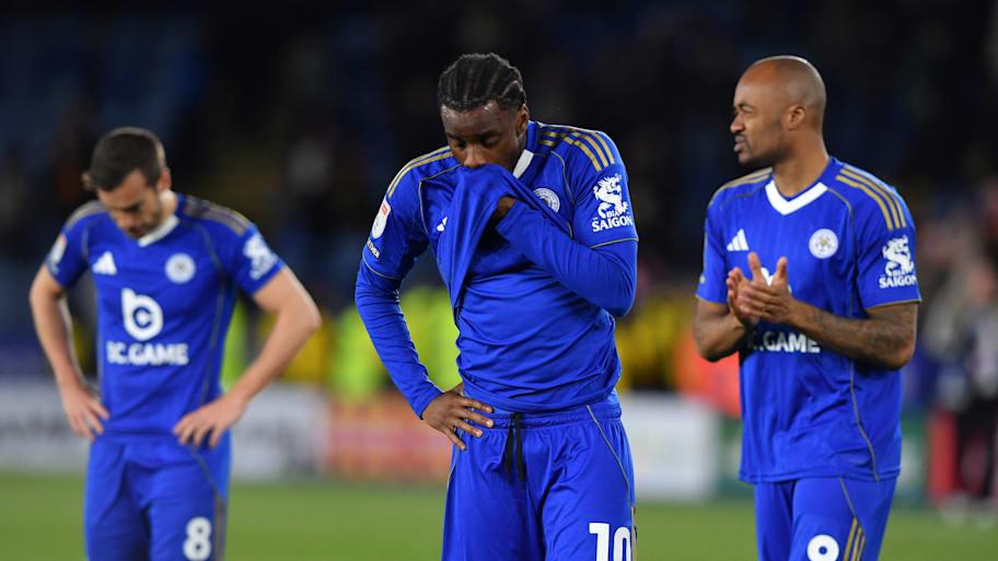 Leicester players looking sad.