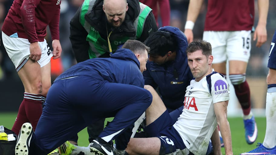 Ben Davies (right) getting treatment.