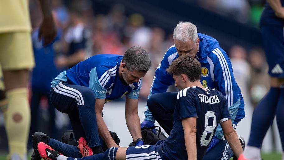 Billy Gilmour receiving treatment.