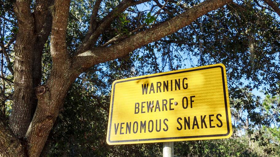 Snake beware sign.