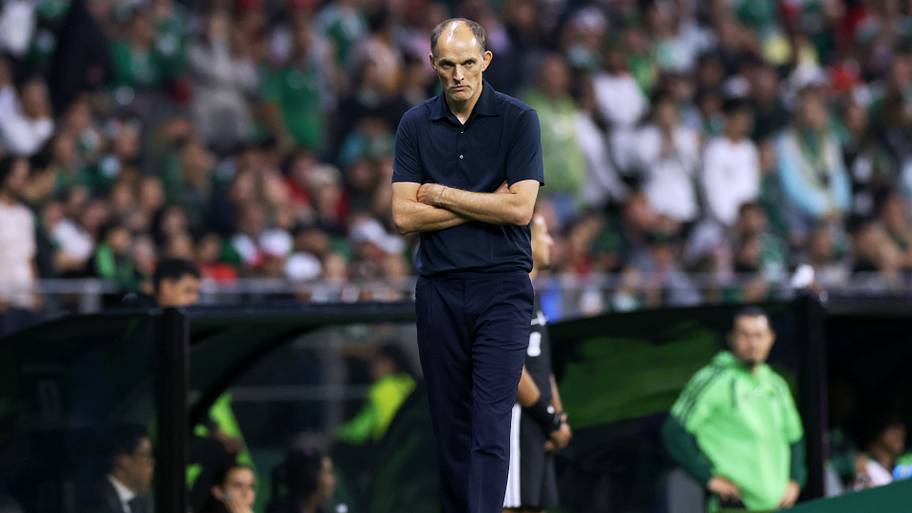 Thomas Tuchel with his arms folded.