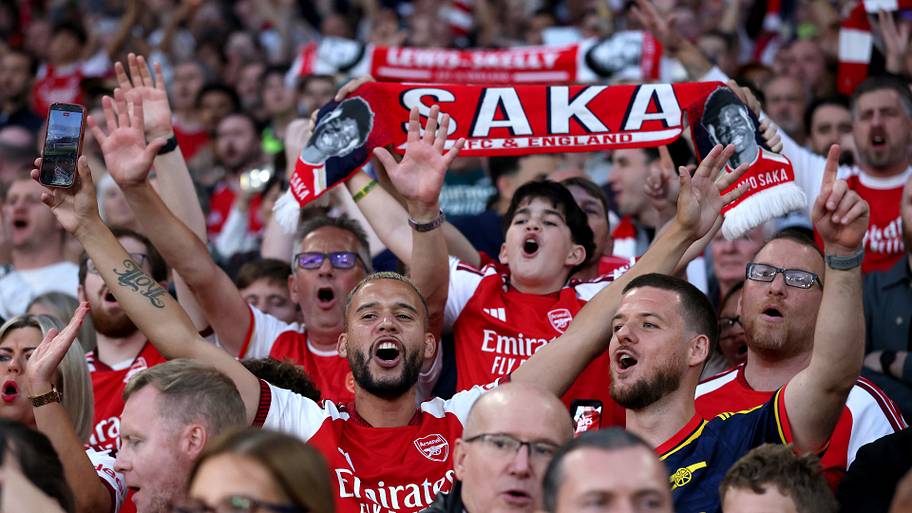 Arsenal fans celebrating.