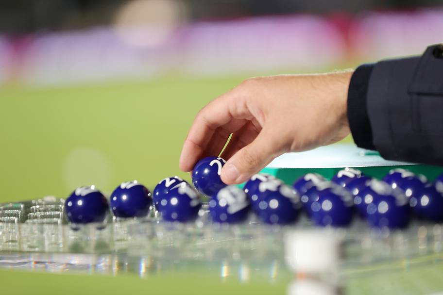 The plucking of the balls.