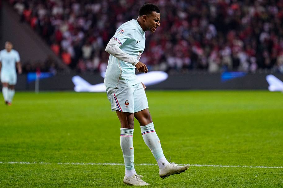 Kylian Mbappé wincing.