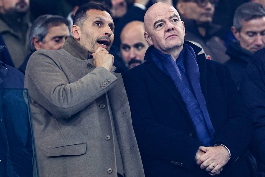Khaldoon Al Mubarak (left) and Gianni Infantino.