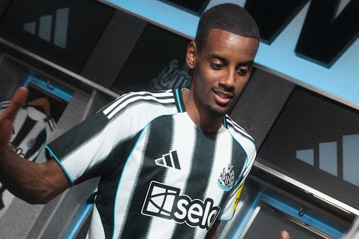 Alexander Isaac in Newcastle's new home kit.