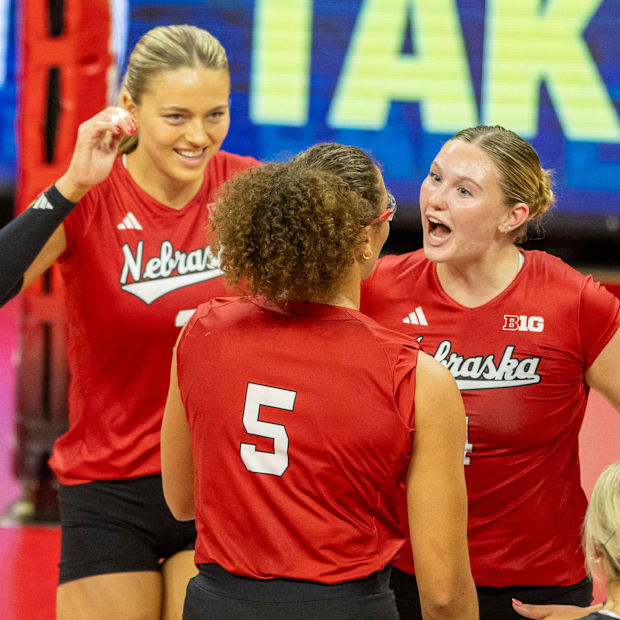 Nebraska setter Campbell Flynn celebrates with middle blocker Rebekah Allick following a point during the Red-White Scrimmage