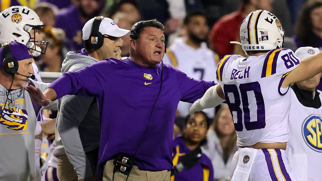 Nov 27, 2021; Baton Rouge, Louisiana, USA; LSU Tigers head coach Ed Orgeron reacts after a play against the Texas A&M Aggies during the first half at Tiger Stadium. Mandatory Credit: Stephen Lew-Imagn Images Nov 27, 2021; Baton Rouge, Louisiana, USA; LSU Tigers head coach Ed Orgeron reacts after a play against the Texas A&M Aggies during the first half at Tiger Stadium. Mandatory Credit: Stephen Lew-Imagn Images