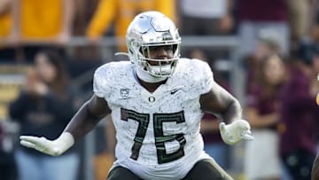 Nov 18, 2023; Tempe, Arizona, USA; Oregon Ducks offensive lineman Josh Conerly Jr. (76) against the Arizona State Sun Devils at Mountain America Stadium. Mandatory Credit: Mark J. Rebilas-Imagn Images