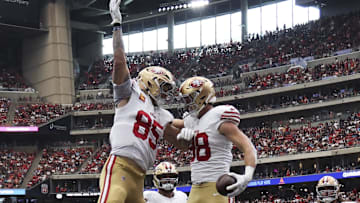 San Francisco 49ers tight end Jake Tonges (88) celebrates with tight end George Kittle (85)