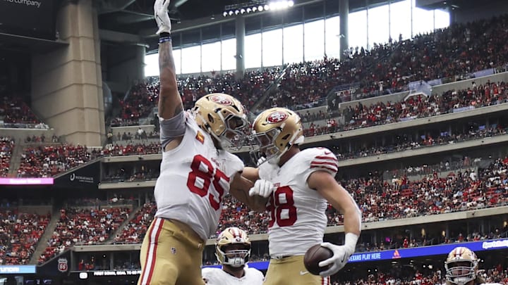 San Francisco 49ers tight end Jake Tonges (88) celebrates with tight end George Kittle (85)