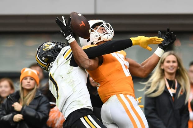 A pass to Tennessee wide receiver Bru McCoy (15) falls incomplete while he is covered by Missouri Tigers safety Jaylon Carlies (1).