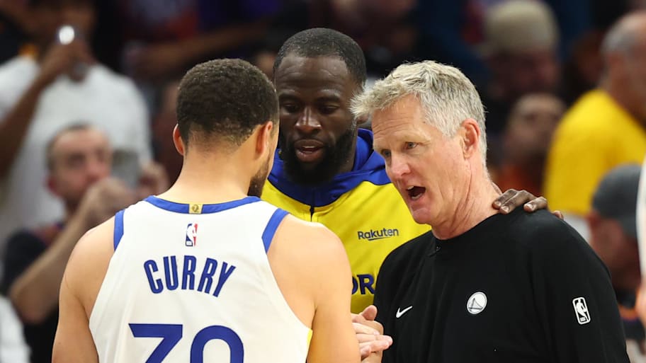 Golden State Warriors guard Stephen Curry with forward Draymond Green and head coach Steve Kerr late in a play-in loss.