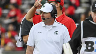 Sep 7, 2024; College Park, Maryland, USA;
Michigan State Spartans head coach Jonathan Smith walks down the sidelines during the first quarter against the Maryland Terrapins   at SECU Stadium. Mandatory Credit: Tommy Gilligan-Imagn Images