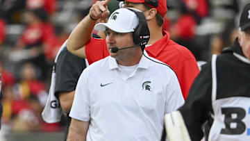 Sep 7, 2024; College Park, Maryland, USA;
Michigan State Spartans head coach Jonathan Smith walks down the sidelines during the first quarter against the Maryland Terrapins   at SECU Stadium. Mandatory Credit: Tommy Gilligan-Imagn Images