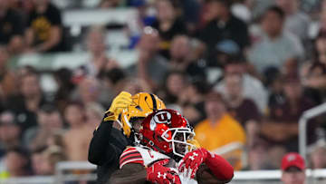 Sep 24, 2022; Tempe, Arizona, USA; Utah Utes cornerback Clark Phillips III (1) intercepts a pass.