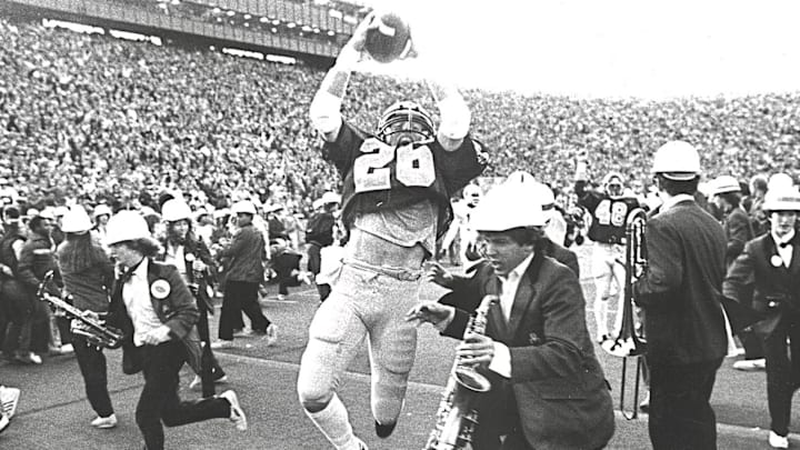 Kevin Moen completes the most famous play in college football history. Kevin Moen completes the most famous play in college football history.
