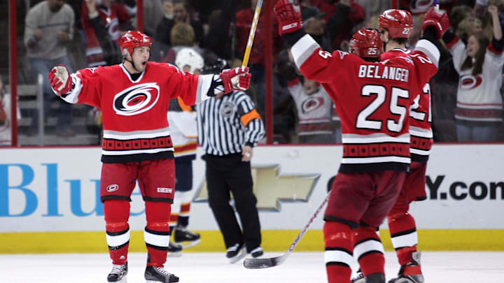 January 11, 2007; Raleigh, NC, USA; Carolina Hurricanes right wing (27) Craig Adams is congratulated by his teammates after scoring the game winning goal during the 3rd period to defeat the Florida Panthers 6-4 at the RBC Center. Mandatory Credit: James Guillory-Imagn Images Copyright (c) 2007 James Guillory