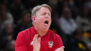 Apr 5, 2024; Cleveland, OH, USA; NC State Wolfpack head coach Wes Moore reacts in the second quarter against the South Carolina Gamecocks in the semifinals of the Final Four of the women's 2024 NCAA Tournament at Rocket Mortgage FieldHouse. Mandatory Credit: Kirby Lee-Imagn Images