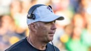 Oct 11, 2025; South Bend, Indiana, USA; NC State Wolfpack head coach Dave Doeren walks on the field against the Notre Dame Fighting Irish during the second half at Notre Dame Stadium. Mandatory Credit: Michael Caterina-Imagn Images