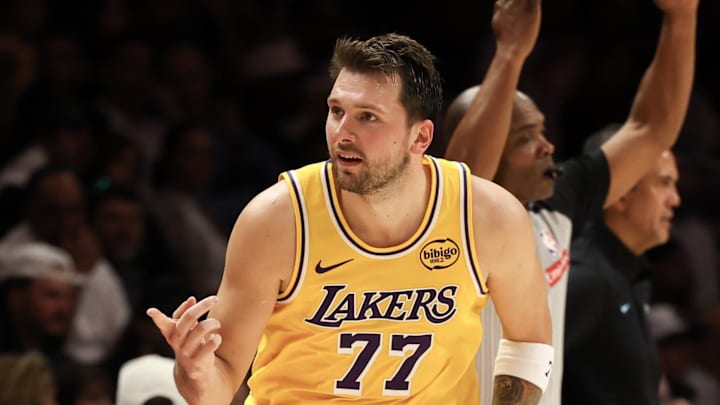 Mar 19, 2026; Miami, Florida, USA; Los Angeles Lakers guard Luka Doncic (77) reacts against the Miami Heat during the second half at Kaseya Center. Mandatory Credit: Isabella Frias-Imagn Images