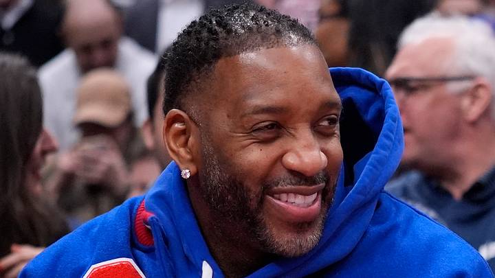 Mar 3, 2026; Toronto, Ontario, CAN; Former Toronto Raptors and Buffalo Bills minority owners Tracy McGrady (left) and Vince Carter (right) sit courtside during a game between the New York Knicks and Toronto Raptors the at Scotiabank Arena. Mandatory Credit: John E. Sokolowski-Imagn Images