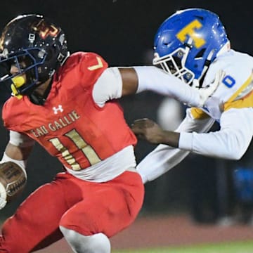 Xavier Lherisse of Eau Gallie escapes the grasp of Titusville’s Zymerius Brown in the Class 3A regional semifinals last season. Lherisse, an Oregon commit, caught 53 passes for 776 yards and nine TDs, made 41 tackles and six interceptions, and had a 42.8 kickoff return average last season.