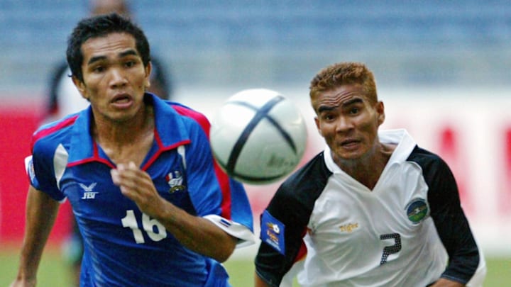 Suriya Domtaisong of Thailand (L) and Jo