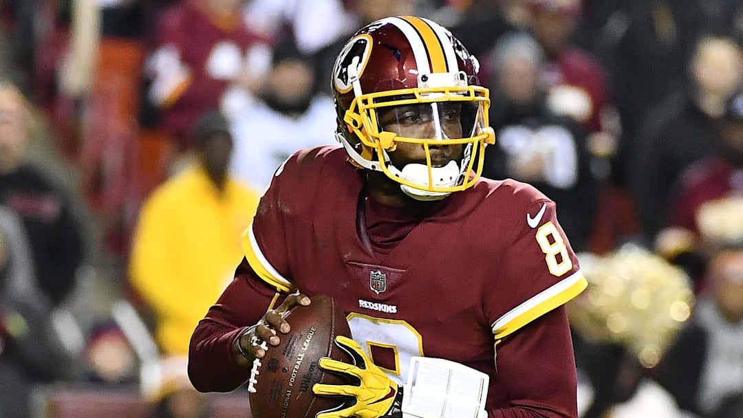 Dec 30, 2018; Landover, MD, USA; Washington Redskins quarterback Josh Johnson (8) rolls out against the Philadelphia Eagles during the second half at FedEx Field. Mandatory Credit: Brad Mills-Imagn Images