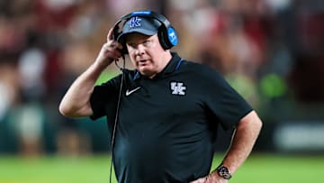 Sep 27, 2025; Columbia, South Carolina, USA; Kentucky Wildcats head coach Mark Stoops directs his team against the South Carolina Gamecocks in the second quarter at Williams-Brice Stadium. Mandatory Credit: Jeff Blake-Imagn Images