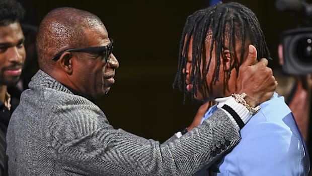 Deion Sanders and Travis Hunter