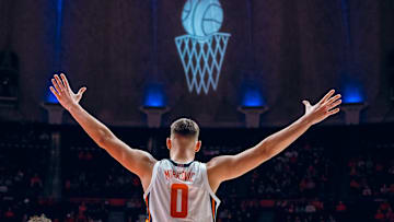 Illinois forward David Mirkovic celebrates during the Illini's 92-65 exhibition win over Illinois State on Sunday at State Farm Center in Champaign, Illinois.
