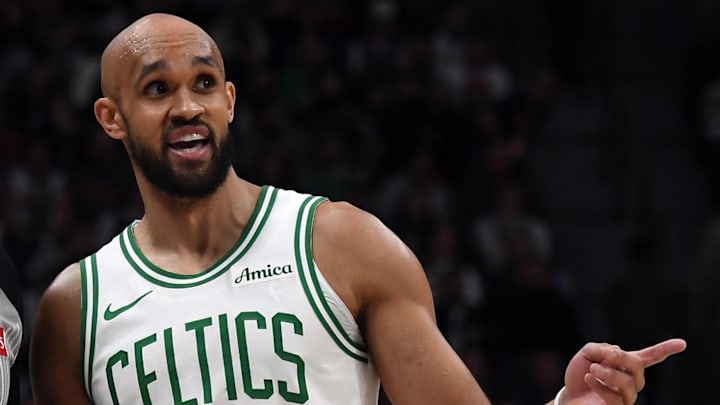 Feb 25, 2026; Denver, Colorado, USA; Boston Celtics guard Derrick White (9) talks with a referee during the second half against the Denver Nuggets at Ball Arena. Mandatory Credit: Christopher Hanewinckel-Imagn Images