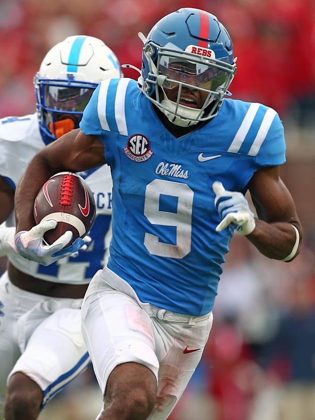 Mississippi Rebels wide receiver Tre Harris (9) runs after a catch.