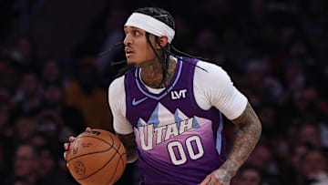 Jan 1, 2025; New York, New York, USA; Utah Jazz guard Jordan Clarkson (00) dribbles up court during the first half against the New York Knicks at Madison Square Garden. Mandatory Credit: Vincent Carchietta-Imagn Images