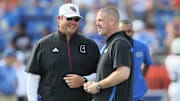 Florida head coach Billy Napier, right, and Mississippi State head coach Jeff Lebby chat before an NCAA football game at Steve Spurrier Field at Ben Hill Griffin Stadium in Gainesville, FL on Saturday, October 18, 2025. 